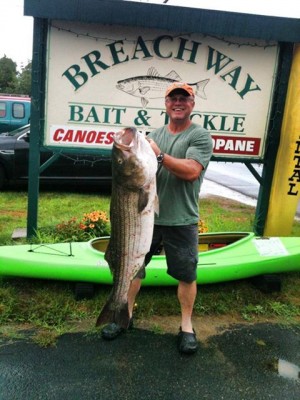 Jack Wosniak with a 47-pound striper caught this week.