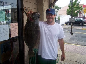 Tim Rawson with a 5.7-pound fluke.