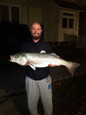 Adam Sotiryadis with a nice late-season striper.