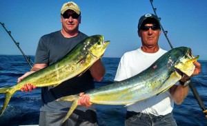 Scott Pillsbury and James Winters with two Mahi caught aboard Riptide Charters