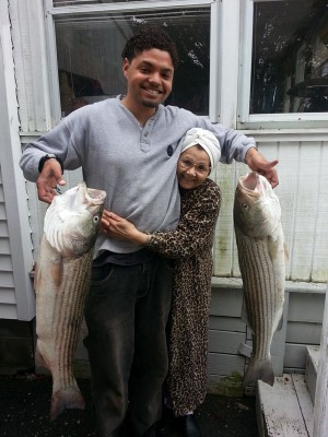 Justin from New Bedford caught these two for Grandma on homemade top water plugs painted like mackerel.