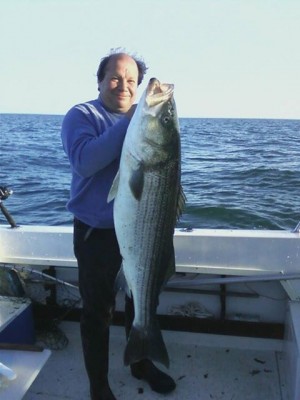 Frank Columbus with a beautiful East End Bass that measured 44.5 inches and topped the scale at 52 pounds! (photo courtesy of Jamesport Bait & Tackle)
