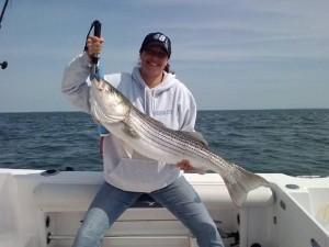 Hope Chagnot with a big bass caught in Connecticut waters.