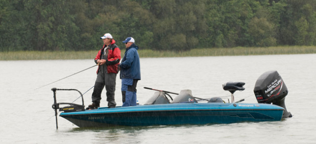 Fishing in the rain can be uncomfortable, but it gives you a good shot at catching a trophy bass.