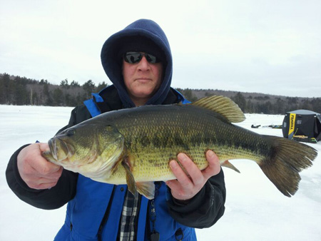 CTFisherman.com's "Trooper Bri" with an awesome late-ice largemouth bass from northwest Connecticut.