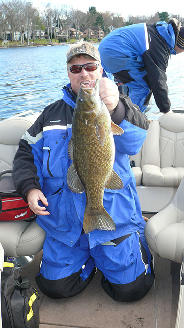 Chris Partelow with a coveted 5-pound smallmouth bass from Candlewood Lake on Tuesday.
