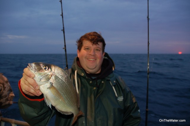 Rich Dunn with a big porgy caught on the first drop of the day. 