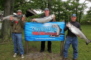 Capt. Bob Buck (center) and the Vision Quest 4 team holds up a trio of big king salmon.