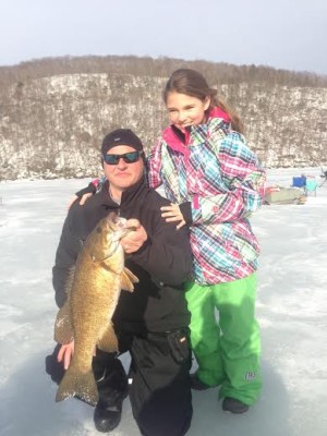 Joe Halas and daughter, Emily, with a beautiful Candlewood smallmouth that tipped the scales at just under 5 lbs.