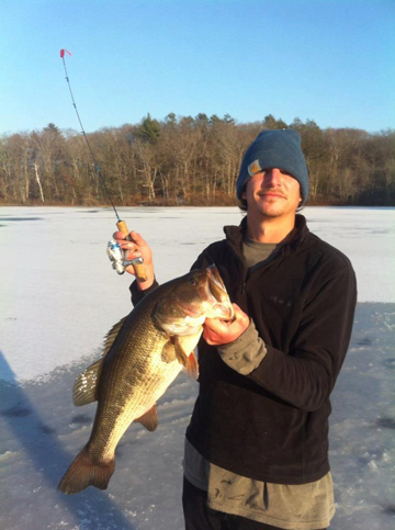 Matthew StPierre shows off a nice bass taken thru the ice last week.