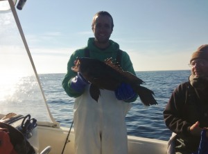 Adam Crouthamel, captain of the Adam Bomb III out of Cape May, displays a 7-pound sea bass caught last week.
