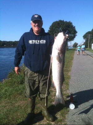 Nikos Tambouratzakis with a 45" canal-caught striper.