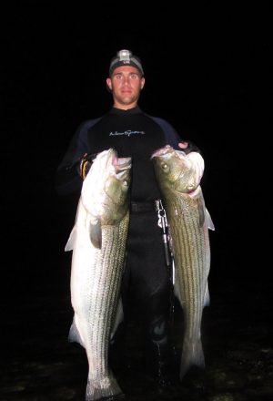 OTW Reader Andrew Jones with stripers of 34 and 25 pounds pulled from eastern Long Island Sound.