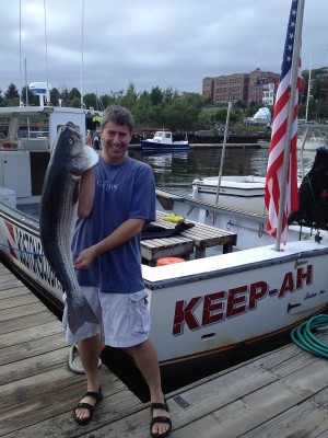 Howard Rudzinsky trolled a green umbrella rig outside Boston Harbor last Saturday to land this 30-pound bass.