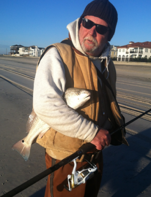 OTW Fishing Forecast writer Mike Shipton shown, obviously stealing someone else&rsquo;s redfish.
