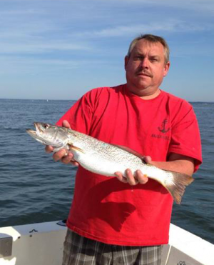 Nate Melanson sent in this photo of his dad with a weakfish caught in CT waters last week.