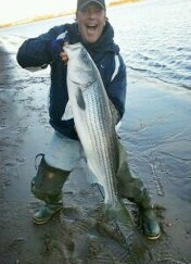Scott Paikin with a nice Delaware River striper.