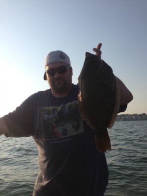 Matt "Magic Moobs" Marascia on his first flounder trip in Hingham Bay this week.