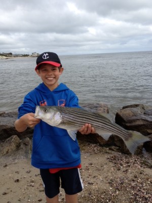 Ben Kingsley with his biggest striper to date, caught at the mouth of the Swan River. 