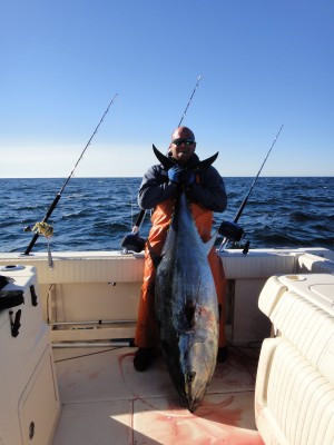 Rick Cuzner with a 67" bluefin caught at the Regal Sword.