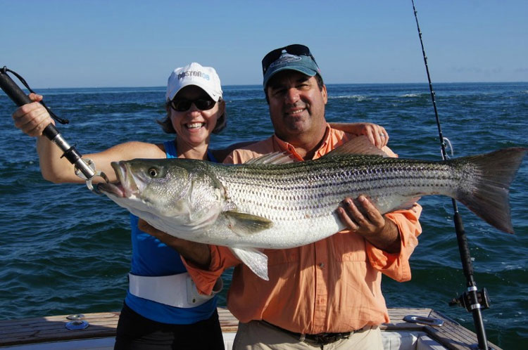 Jen Ryan and Ken Cirillo with a 27-pound Monomoy bass, big enough to win the Osterville Rotary Tournament on Saturday.
