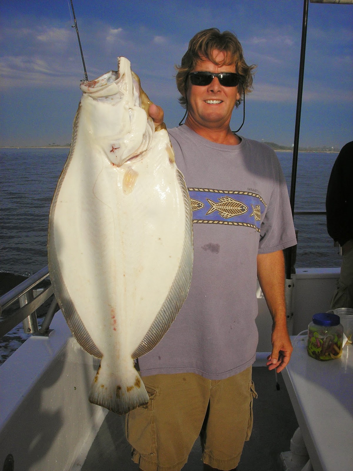 Frank Vivenzio with a 8 1/4 lber taken while fishing aboard the Sea Tiger II this week.
