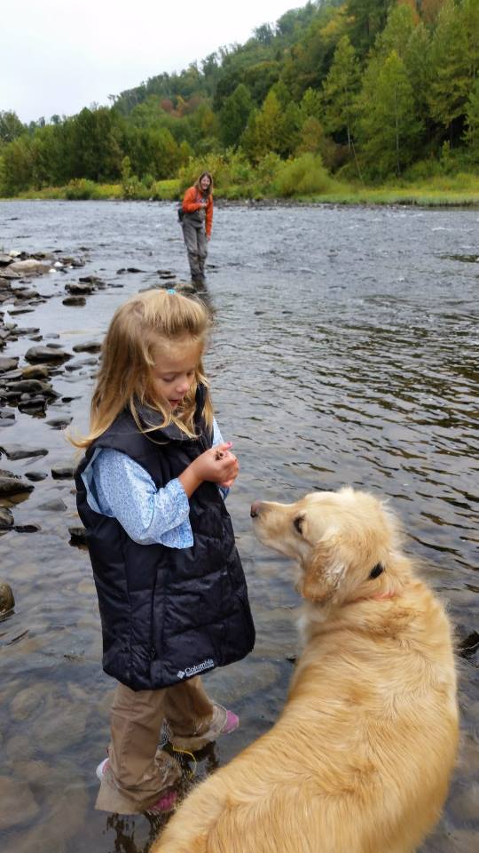 Anglers of all ages were enjoying some fishing on Pine Creek over the weekend. This is Evangeline Daniel fishing with a Fall Fish she caught; Brookie, the Golden Retriever; and Evangeline’s mother in the background. Photo by Julie Szur