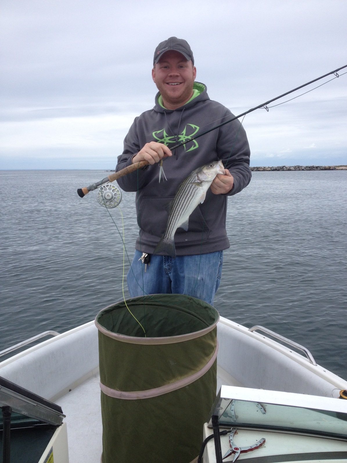 Brian Sippel with a typical North Shore schoolie caught on a fly.