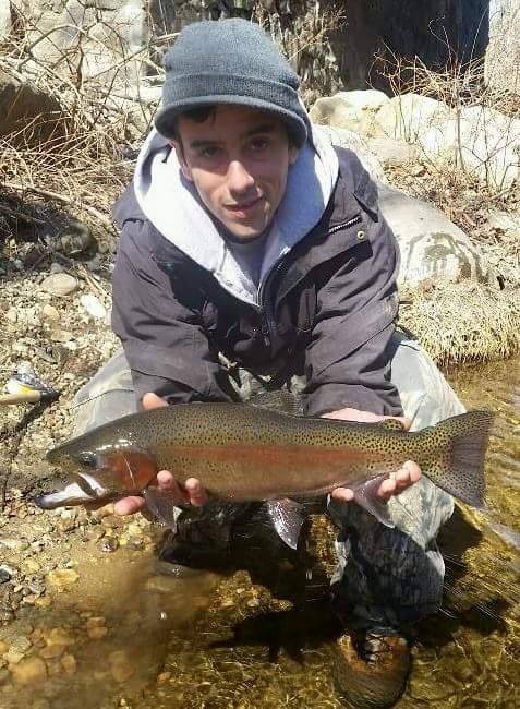 Matthew Musumano with a gorgeous rainbow trout.
