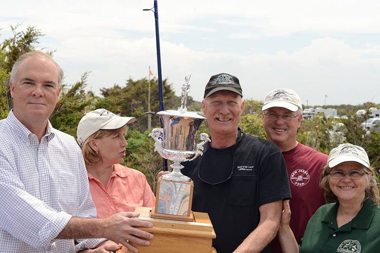 Rich Bergman, of Atco NJ pulled in a 32 inch striped bass to win this years Governor's Surf Fishing Tournament on Sunday at Island Beach State Park.