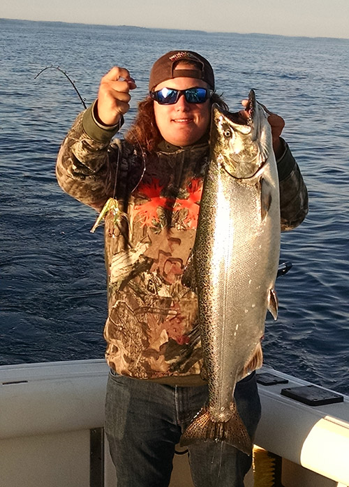 Hunter McPherson with a prized Lake Ontario King Salmon.