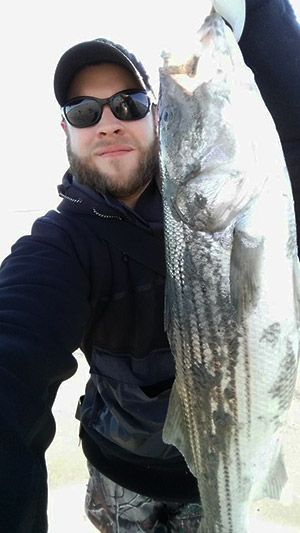  selfie with a 36" striper was taken off a Greater Boston Beach