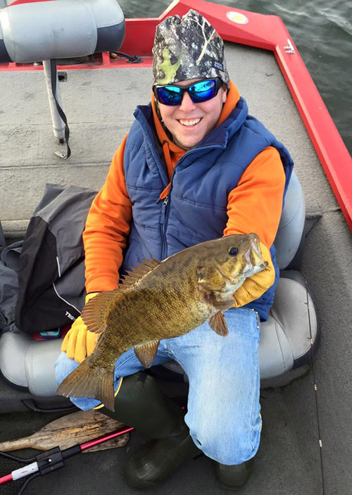 Die-hard Vermont bass angler Ben Cayer with a fat, December smallmouth from Lake Champlain.