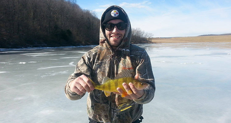 Luke Ditzler took advantage of warmer weather and good ice conditions this past weekend.  He caught quite a few Yellow Perch while out.  Way to go Luke!  (photo provided by angler)