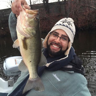 Omar Curi with a 5-pound RI largemouth.