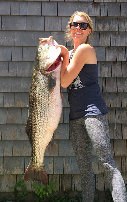 Sarah Heuer with a 40 lb bass taken just outside Moriches inlet 