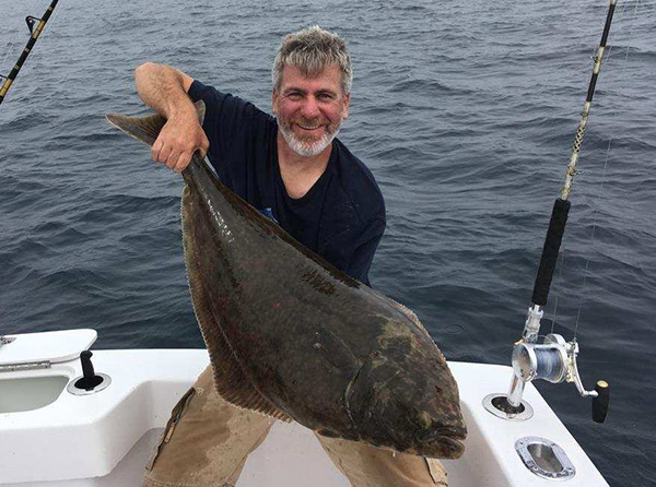 Dan Herman's halibut fell for a jig anthed "pelican green teaser" combo.