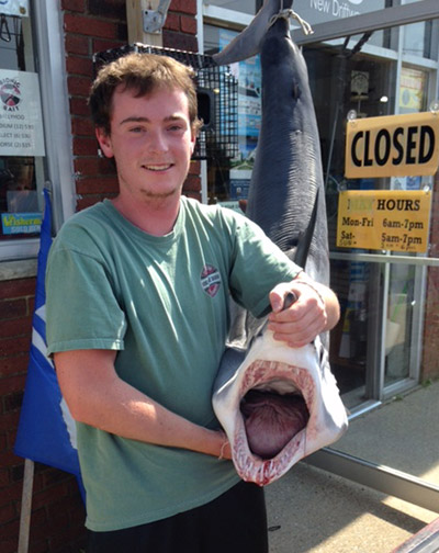 Eric Murray with a 6' mako caught by Stellwagen