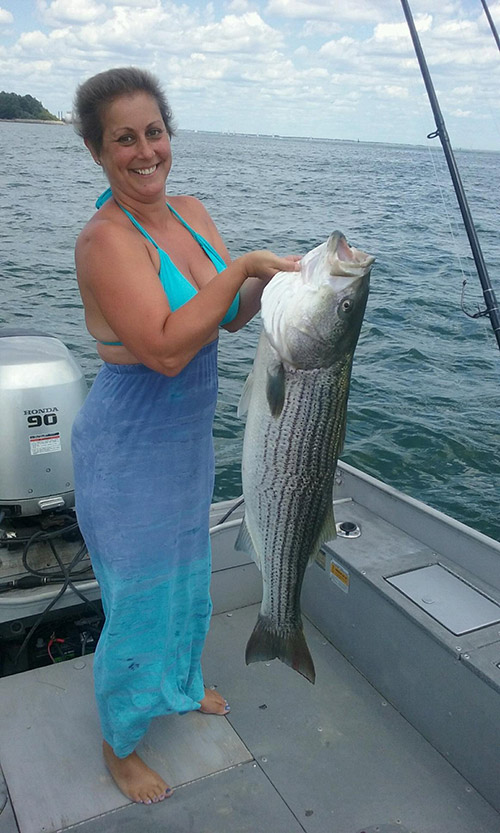 Tracey Cuzzupe used a pogy to catch this 28 pounder aboard On The Rocks in Boston Harbor.
