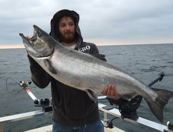 Ed Shannon shows up a 30-plus pound Niagara Bar king caught on Kingfisher Charters.