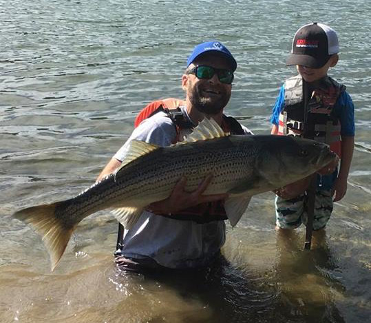 Maine-based Mike Baker of Kayak Fish New England landed this cow striper just minutes after launching.