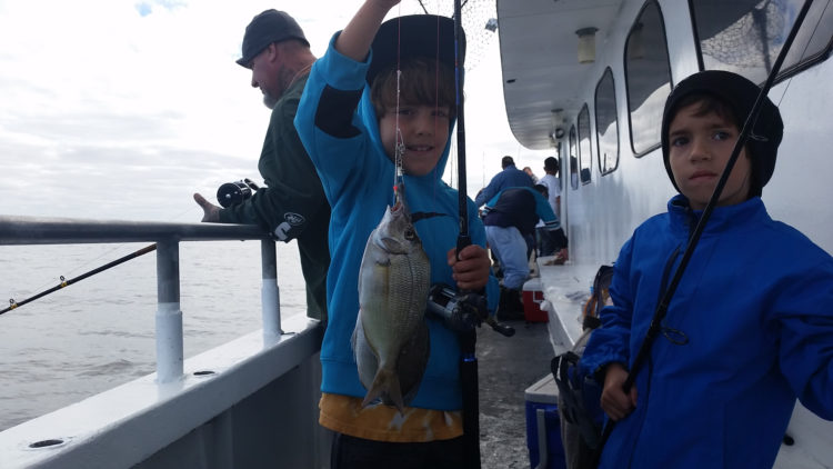A happy porgy angler aboard the Ocean Explorer out of Belmar.
