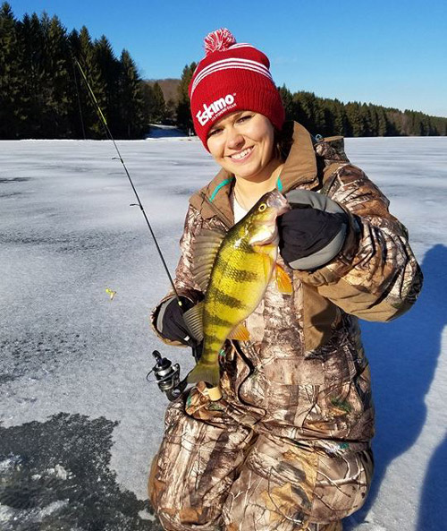 A FIRST!! Hills Creek Lake was the lake that Miranda Hendrix chose to experience ice fishing for the first time.  While on her inaugural trip, she caught a Yellow Perch. 