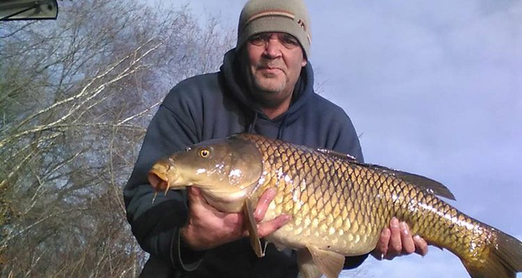 Jeff Henderson with a 16-pound Rhode Island carp.
