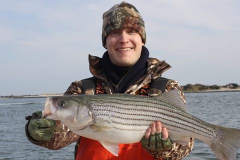 Locating the warmest water is the key to catching the first stripers of the season.