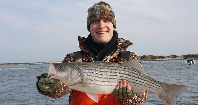 Locating the warmest water is the key to catching the first stripers of the season.