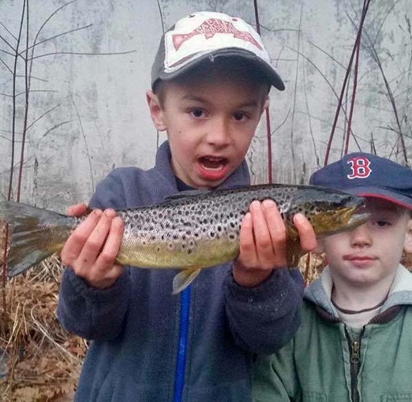 Local guide Zach St. Armand's youngest son with one of many nice March trout they got last week.