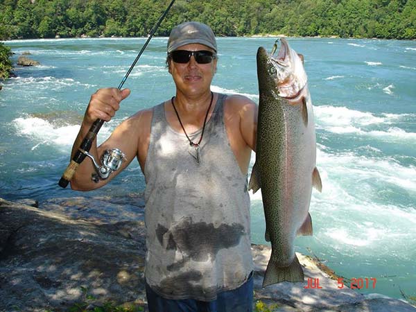 Mike Rzucidlo with July 5th steelhead