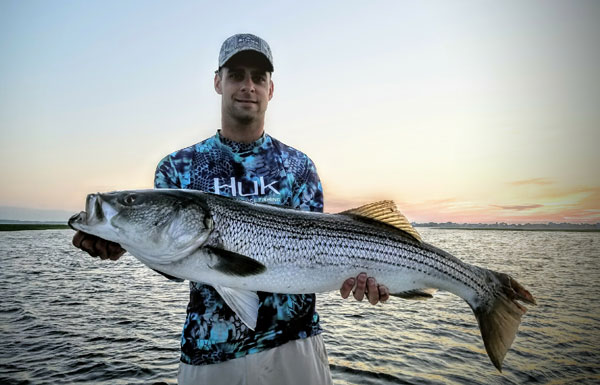 Nothing beats catching pigs at Plum Island on top water at sunrise!  Jake Yaris landed this big topwater bass this week.