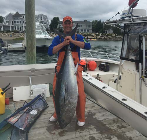 Captain Mark Rowell of Legit Fish Charters with a medium size "Charlie"